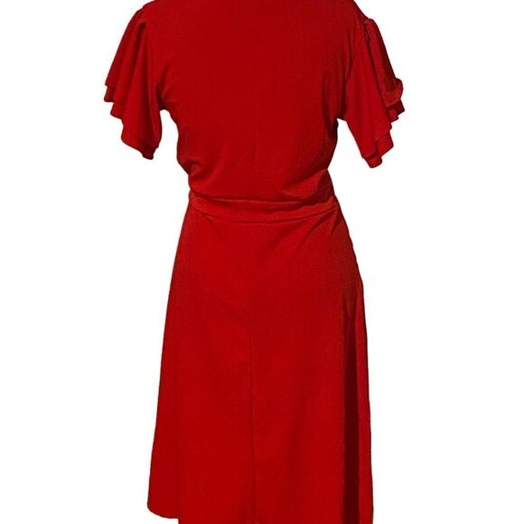 Beautiful boutique dress ordered online size medium pic has a shadow never worn - Picture 2 of 3